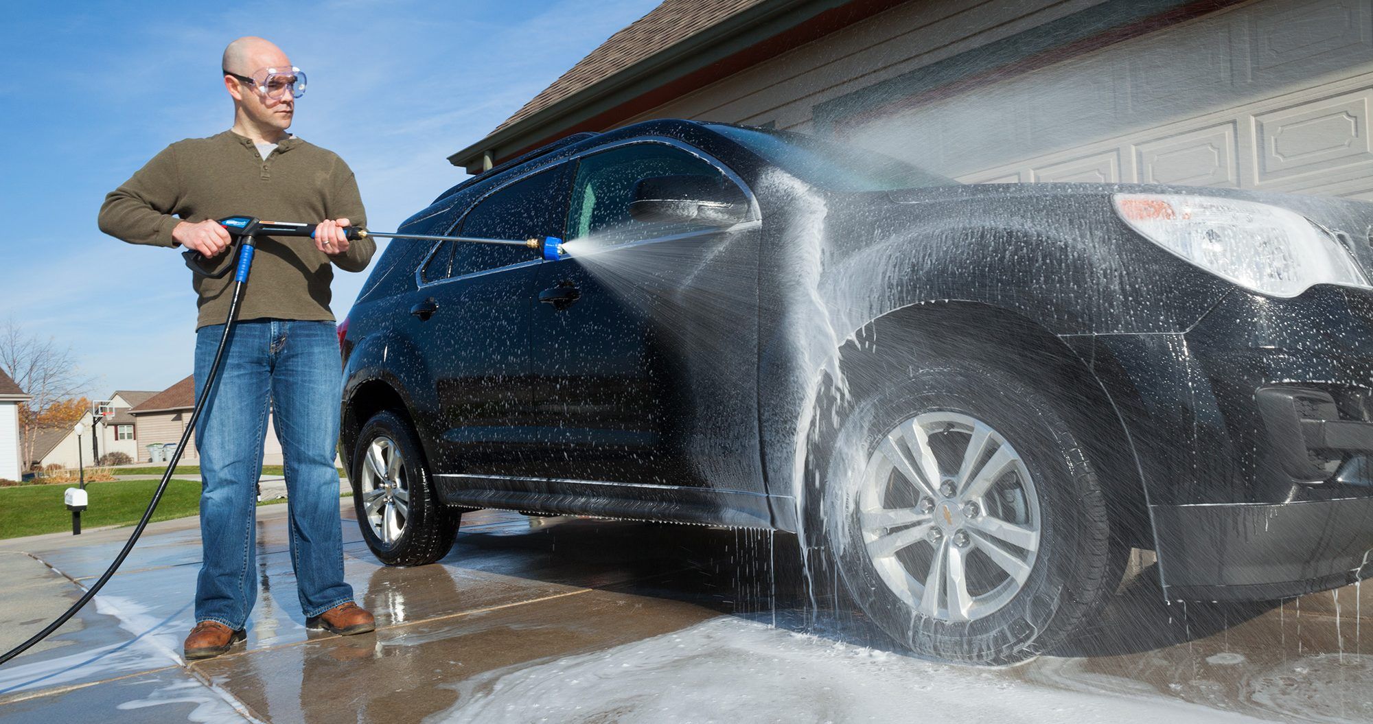 adding car wash soap to pressure washer